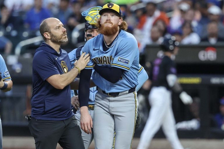 Brewers’ Dustin May exits early after first‑pitch liner injures back
