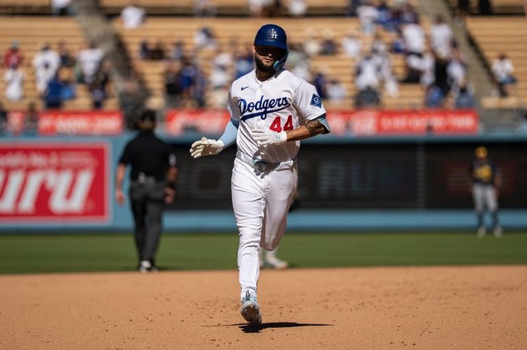 Dodgers center fielder Andy Pages exits game with left hand injury